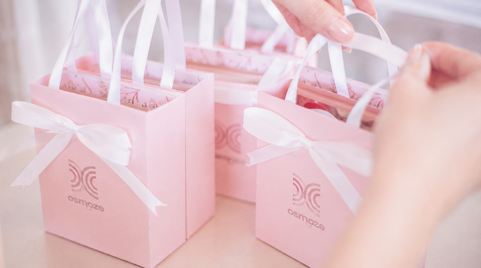 Coffrets cadeaux OSMOZE prêts à être offerts